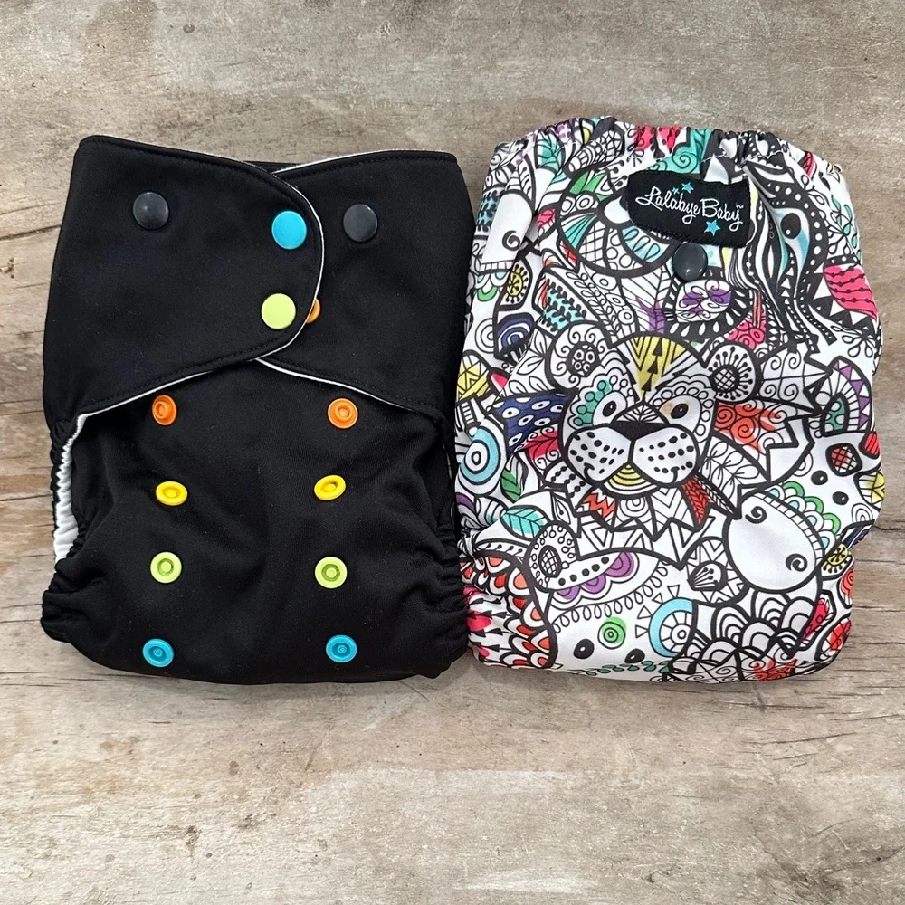Lalabye Baby, one size cloth diapers reusable. Pair, one print one solid. *USED*